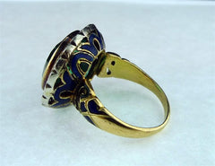 Antique Emerald Ring in Enameled 18K Yellow Gold with Diamond Surround