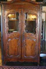 Antique French Armoire with Carved Bonnet and Glass Doors