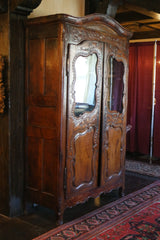 Antique French Armoire with Carved Bonnet and Glass Doors