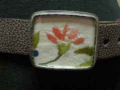B-Low the Belt  Framed Pink Flower Embroidered Fabric Remnant on Brown Belt