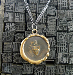 Pyrrha Bronze Crest Pendant Necklace