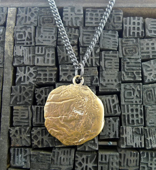 Pyrrha Bronze Crest Pendant Necklace
