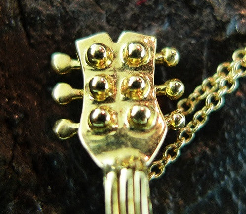 Mia and Ko. Guitar Necklace/Brooch in 18K Yellow Gold