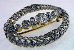 Antique Oval Shaped Diamond Brooch in Platinum and 18K Yellow Gold