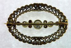 Antique Oval Shaped Diamond Brooch in Platinum and 18K Yellow Gold