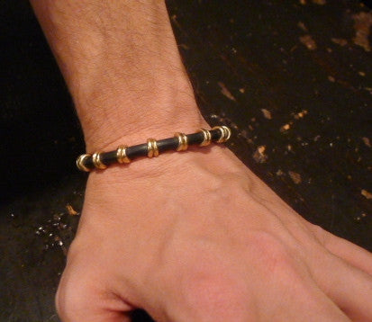 Heston Bracelet in 18K Yellow Gold  on Black Rubber Cording