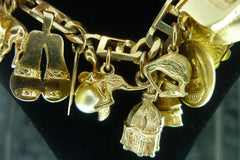 NM Estate Estate 14K and 18K Yellow Gold Charm Bracelet