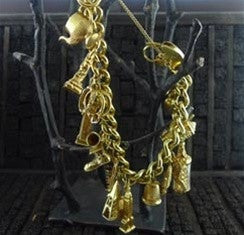 Heavy and Resplendent Vintage Estate Charm Bracelet in 14K Yellow Gold