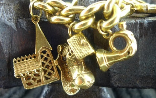 Heavy and Resplendent Vintage Estate Charm Bracelet in 14K Yellow Gold