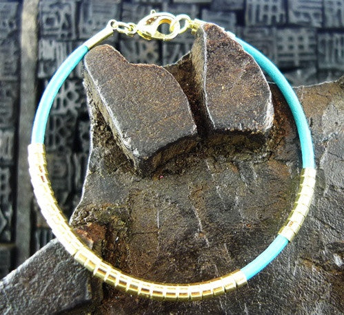 Marcia Moran Turquoise Leather Cord Bracelet with Gold Finish Sliding Beads