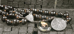 Kimmie Winter Coated Bean Rosary Necklace