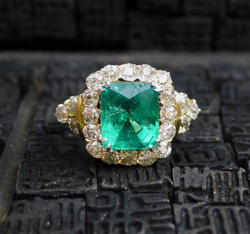 Circa 1890 Cushion Shaped Emerald and Diamond Ring in 18K Yellow Gold