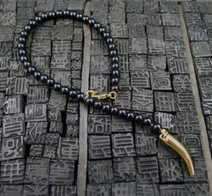 CC Skye Rosary Bracelet in Black Beads and Gold Tone Horn Charm