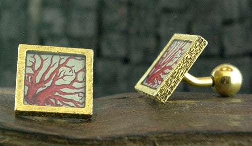 John Wind Goldtone Cufflinks with a Red Coral Branch Design on Cream Background